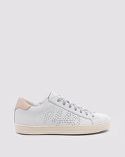 Side angle of white and pink sneakers