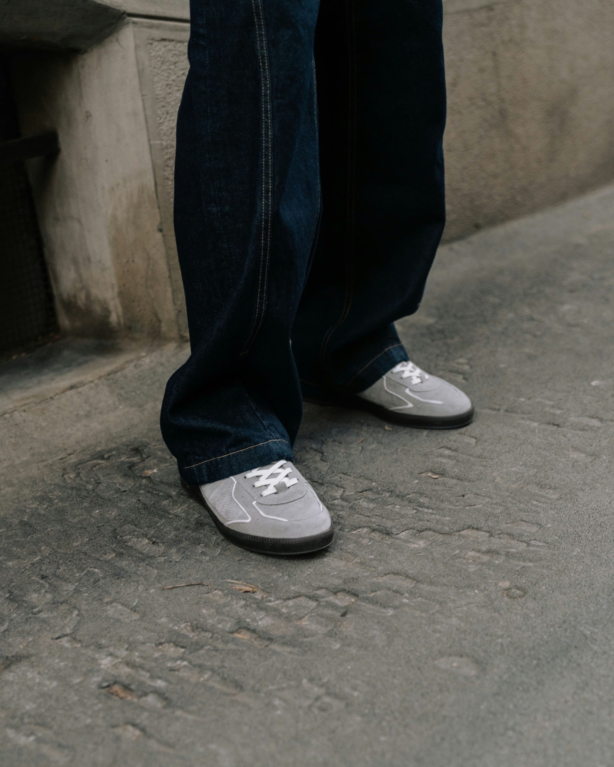 Front angle of grey and white sneakers