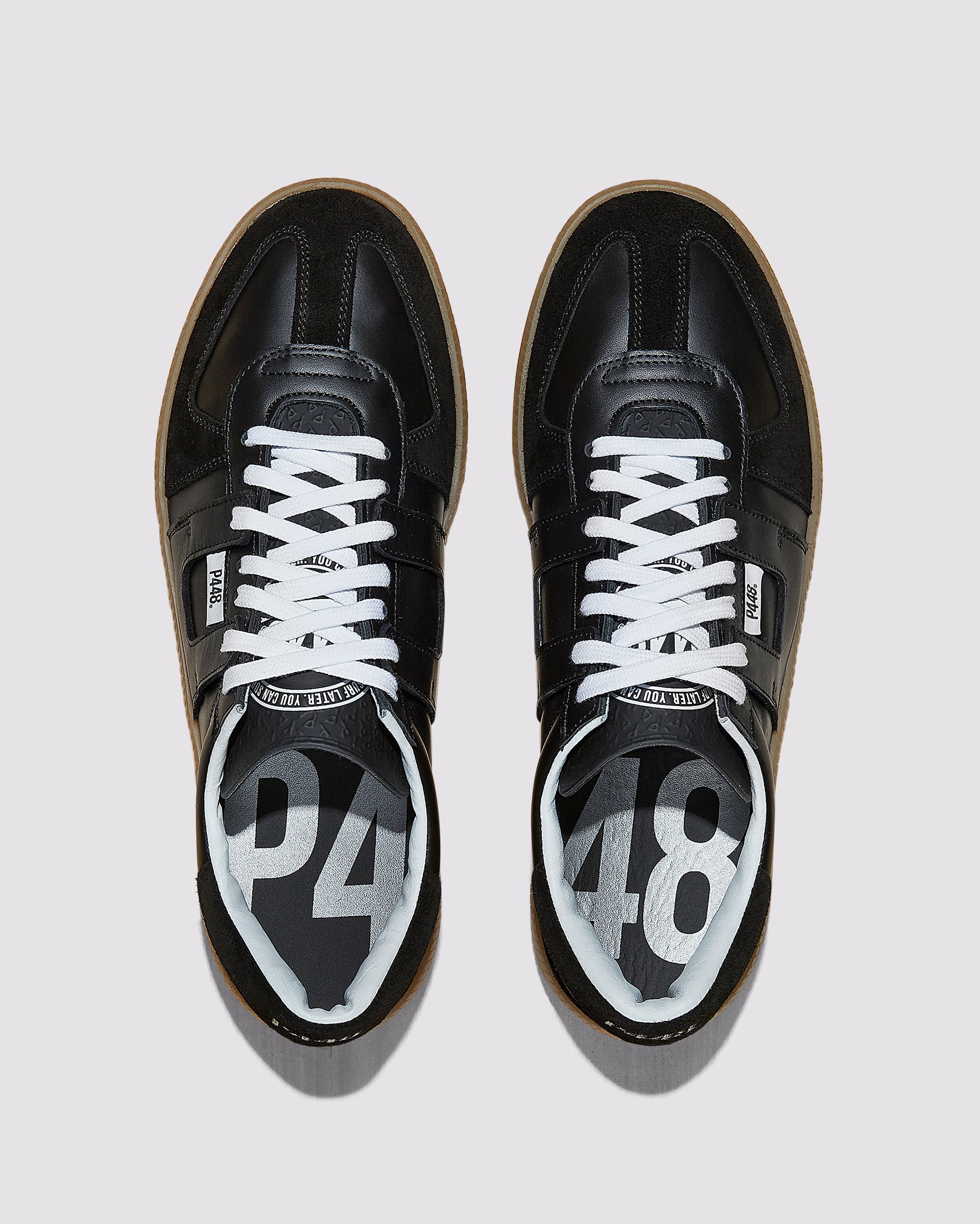 Front angle of black sneakers