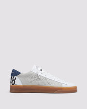 Side angle of beige and navy sneakers
