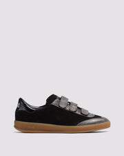 Side angle of black and silver sneakers