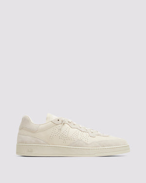 Side angle of beige sneakers