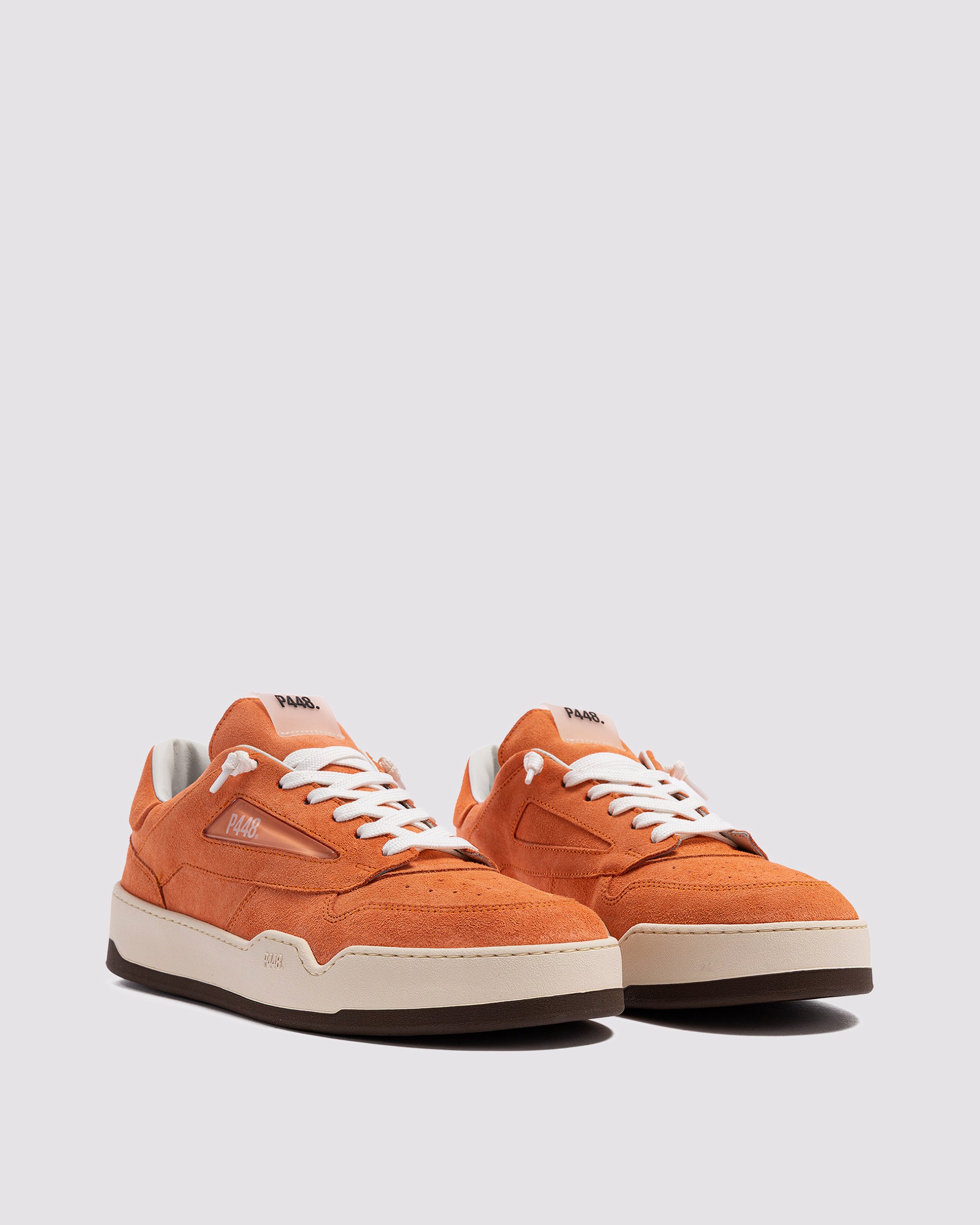 Side angle of orange sneakers