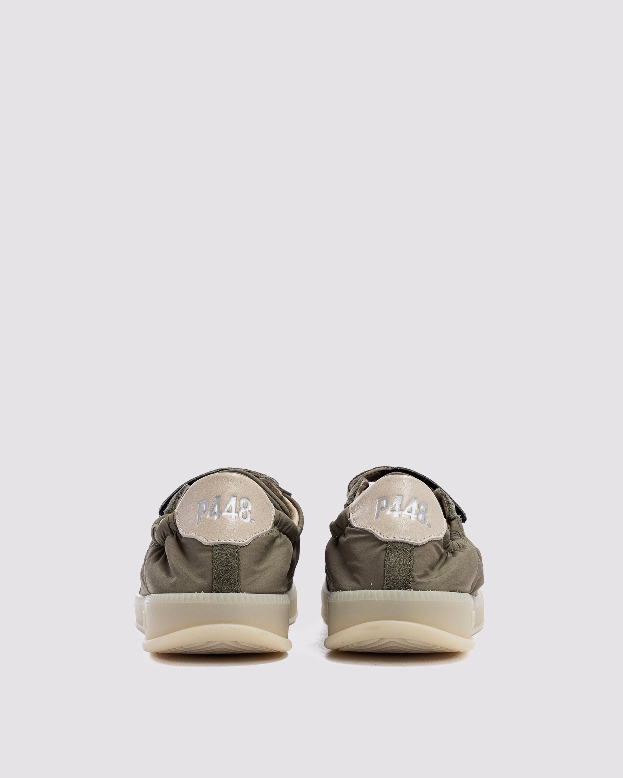 Side angle of nylon green sneakers
