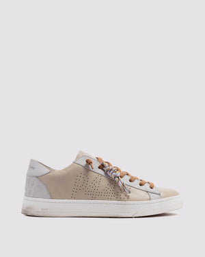 Side angle of beige sneakers