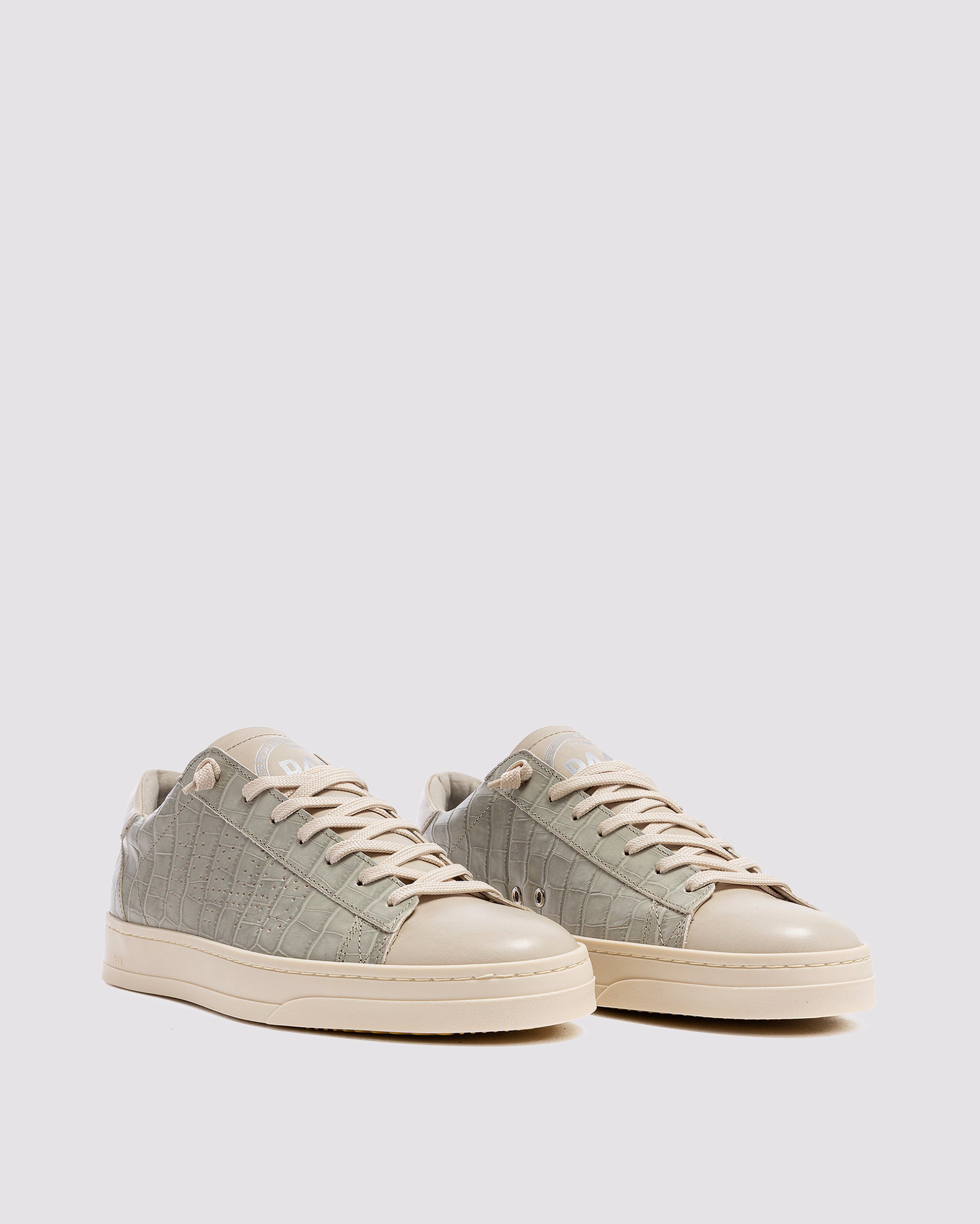 Side angle of green sneakers