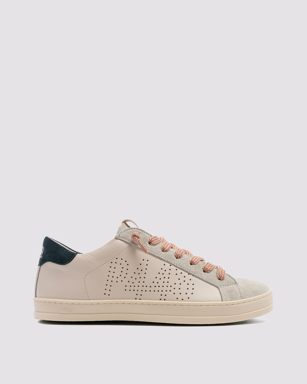 Side angle of beige sneakers