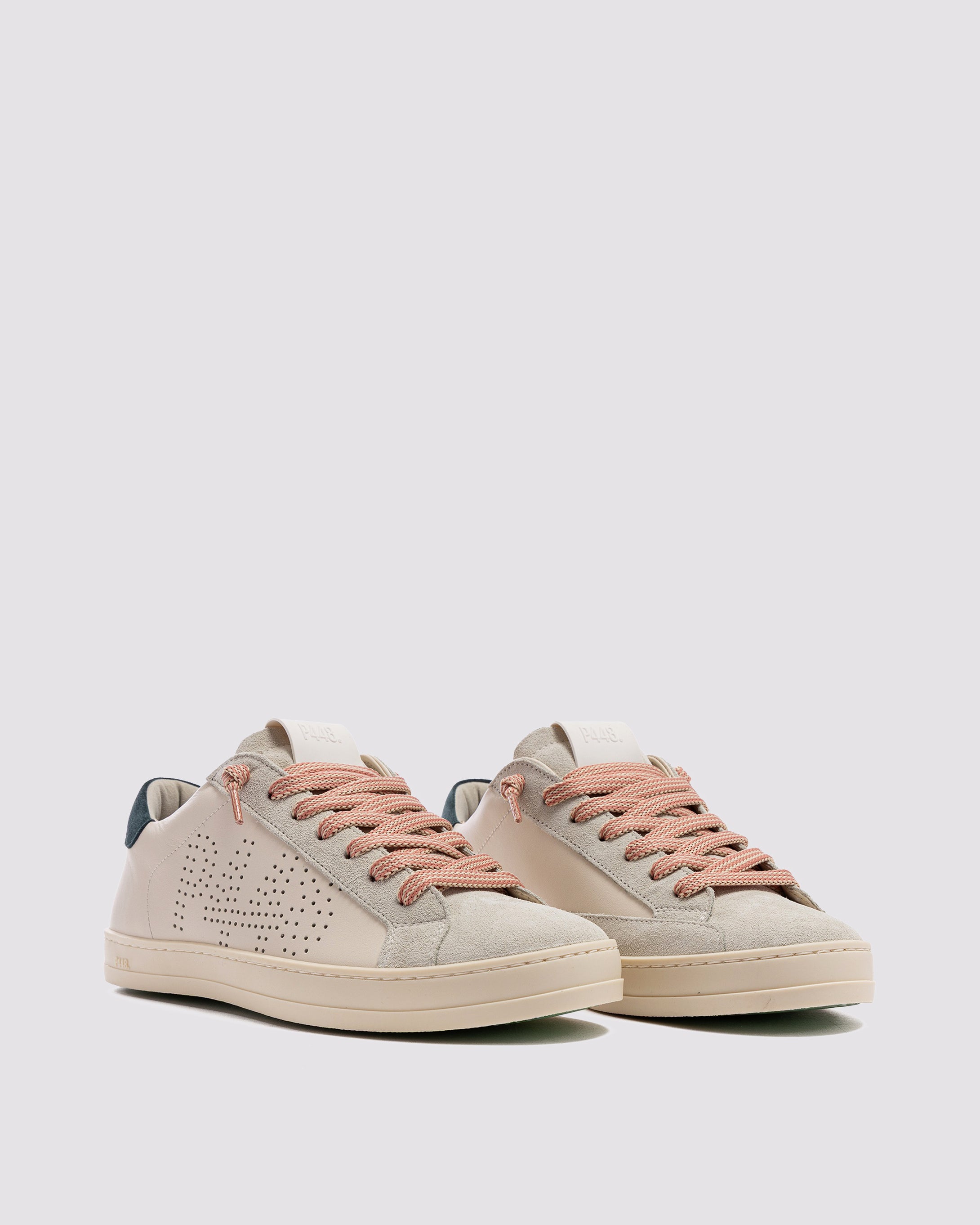 Side angle of beige sneakers