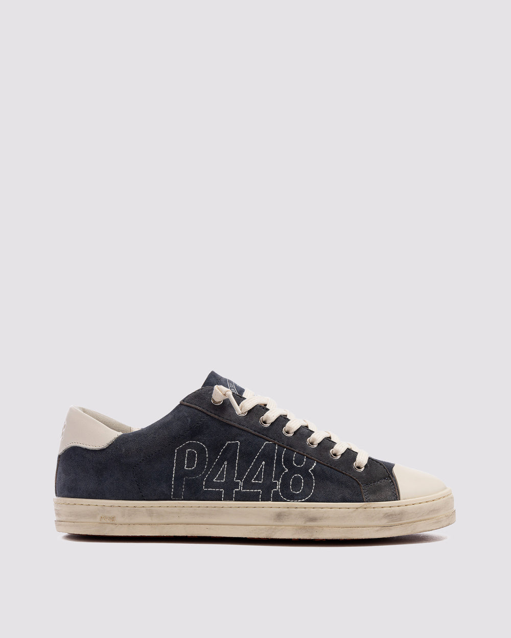 Side angle of blue sneakers
