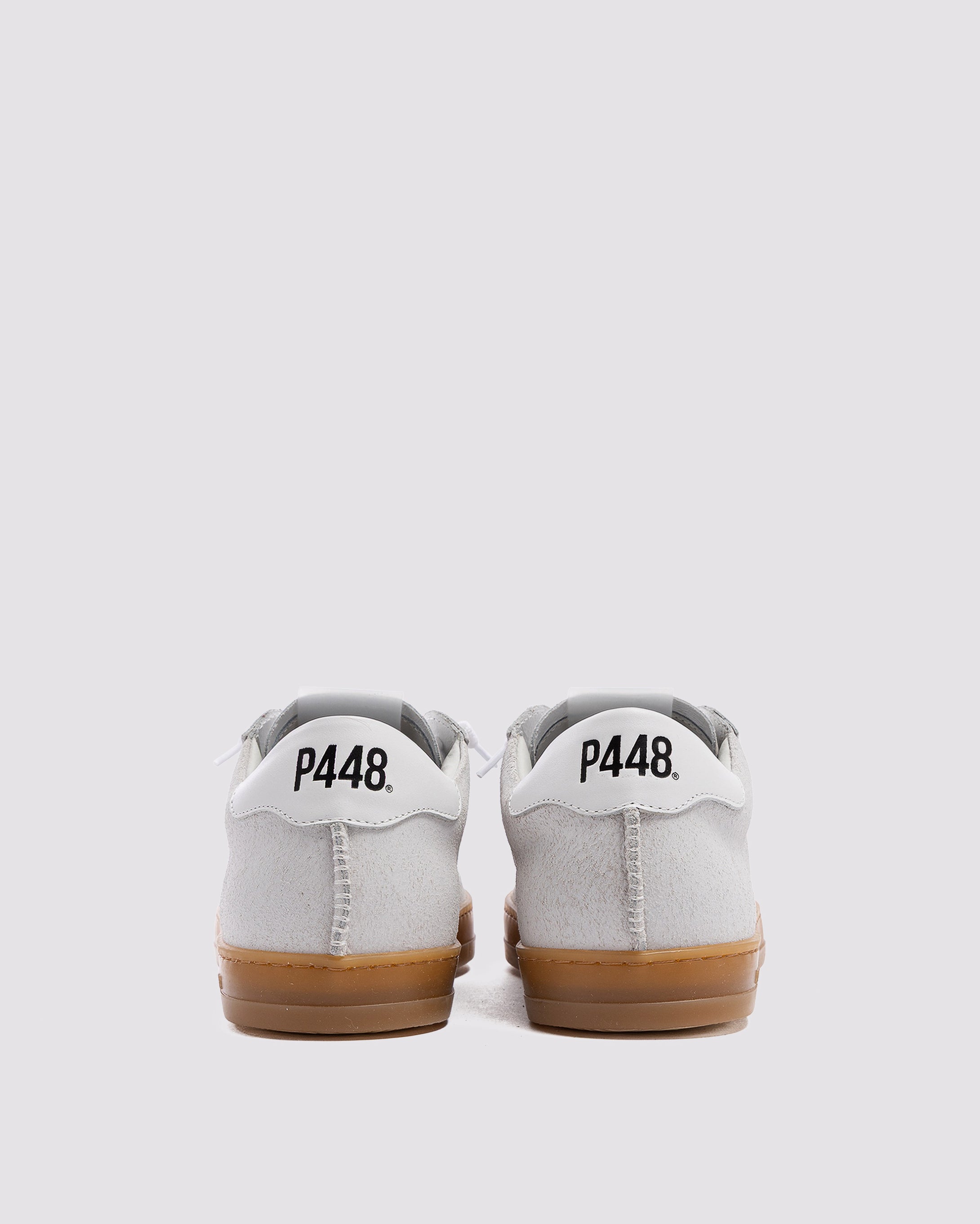 Side angle of off-white sneakers