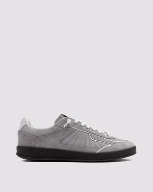 Side angle of grey and white sneakers