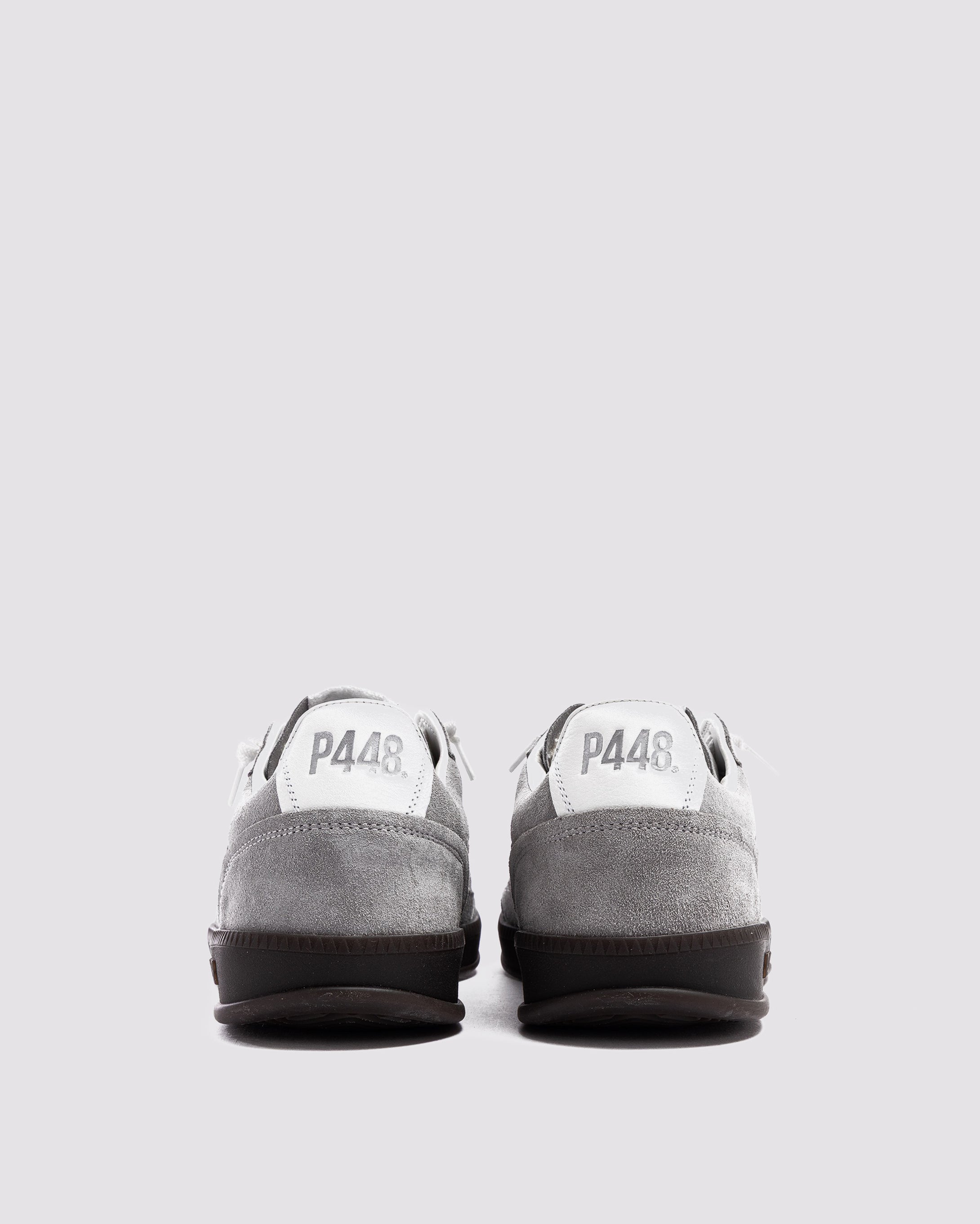 Side angle of grey and white sneakers