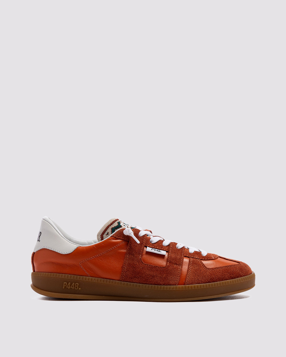 Side angle of orange sneakers