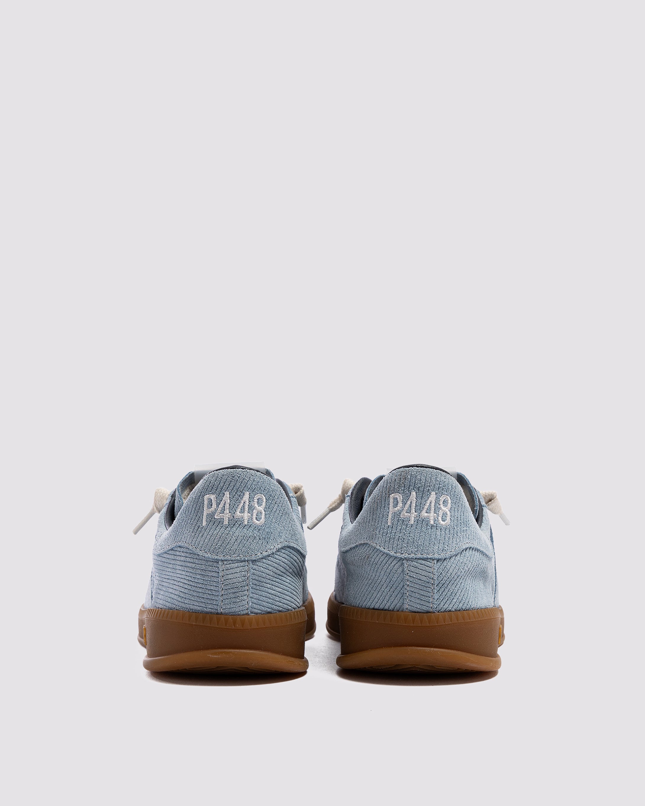 Side angle of blue sneakers