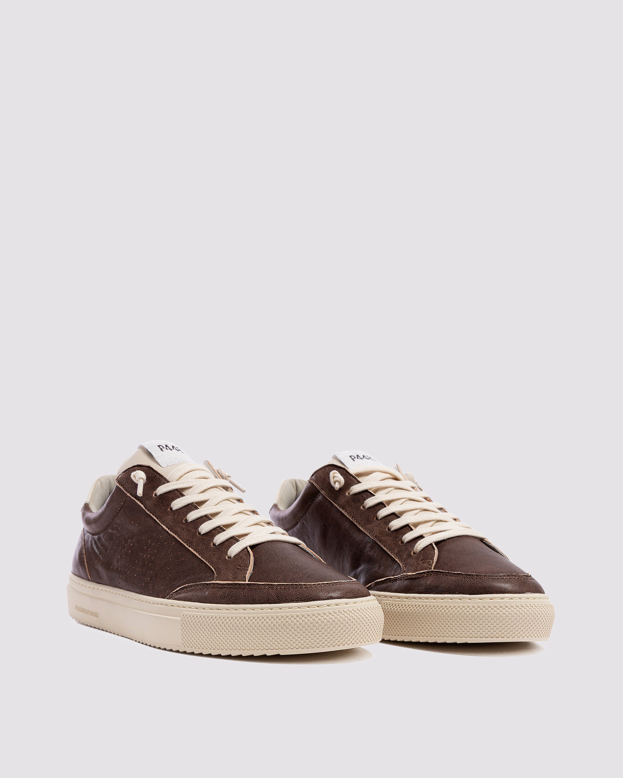 Side angle of brown sneakers