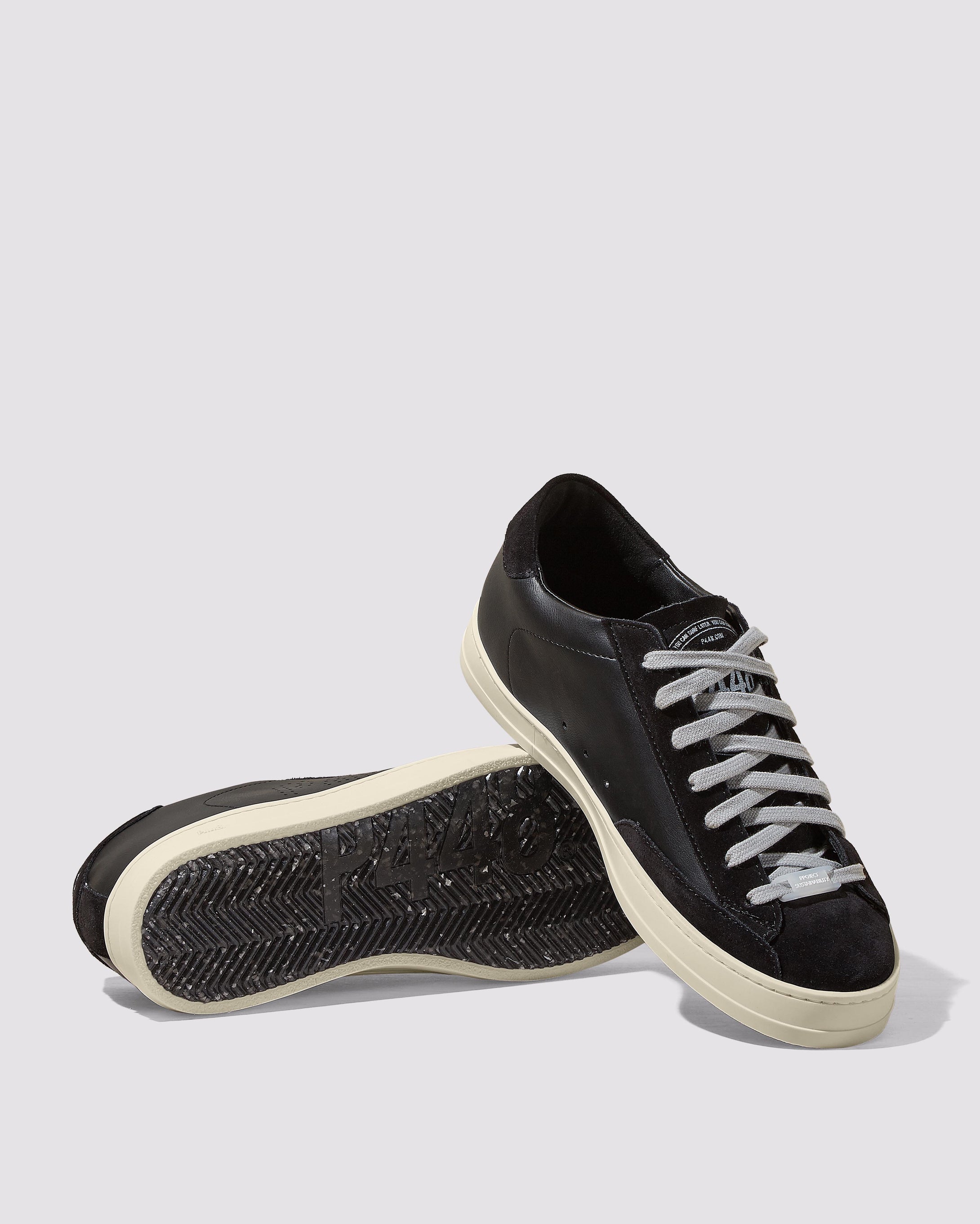 Side angle of recycled black sneakers